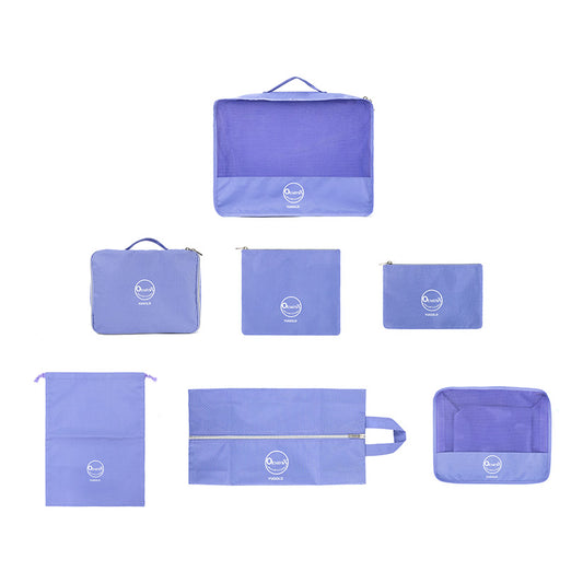 Close‑up of purple cable and toiletry pouches from the 7‑piece set