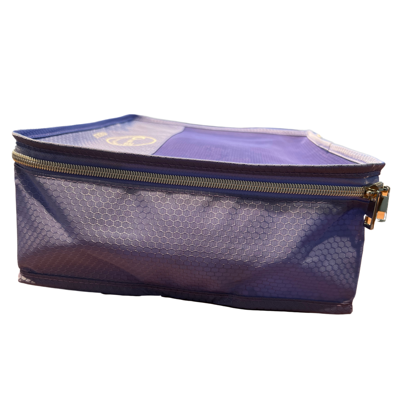 Close‑up of purple cable and toiletry pouches from the 7‑piece set